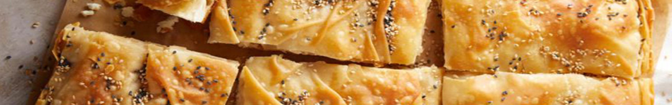 Τυρόπιτα με πικάντικη φέτα, γραβιέρα, γιαούρτι και σπιτικό φύλλο
